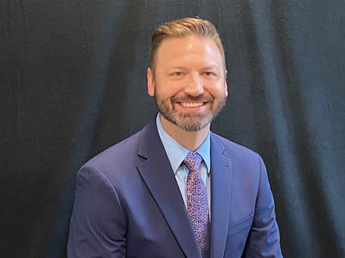 Kris Simms Principal